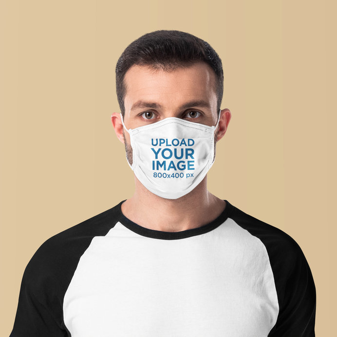 Placeit - Mockup Featuring a Serious Man Wearing a Sublimated Face Mask ...