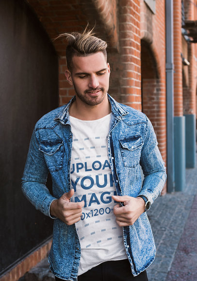 T-Shirt Mockup of a Stylish Man Walking Down the Street