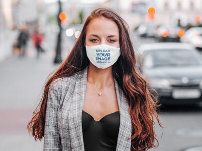 Face Mask Mockup of a Serious Long-Haired Woman Posing on the Street