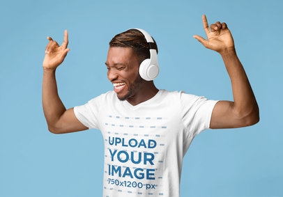 V-Neck Tee Mockup of a Man Enjoying Some Music in a Studio 
