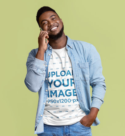 T-Shirt Mockup of a Man Talking on the Phone at a Studio 