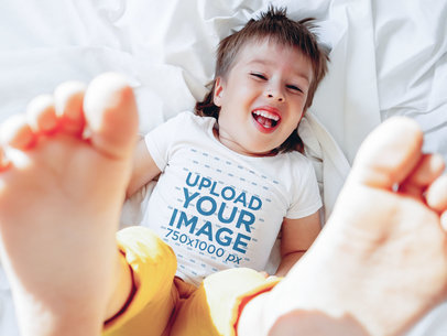 T-Shirt Mockup Featuring a Kid Having Fun 
