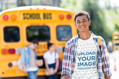 T-Shirt Featuring a Teenage Boy and a High-School Bus in the Background