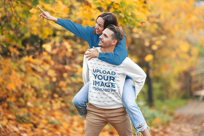 Sweatshirt Mockup Featuring a Man and His Girlfriend in a Park 