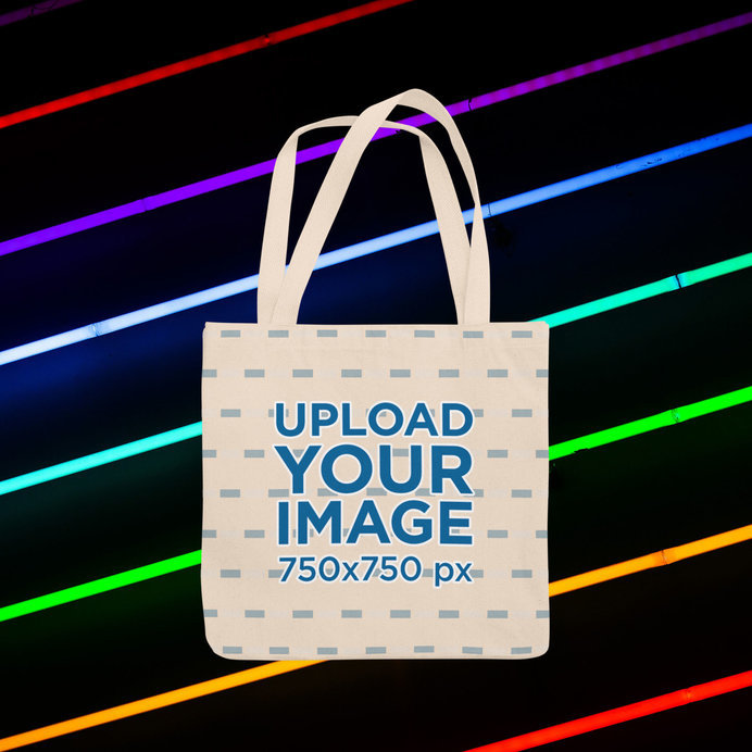 Tote Bag Mockup Featuring a Customizable Background with Neon Lights