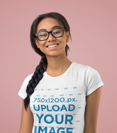 Basic T-Shirt Mockup of a Smiling Woman Against a Colored Backdrop