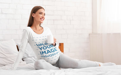 Long Sleeve Tee Mockup Featuring a Happy Pregnant Woman Drinking Her Morning Coffee