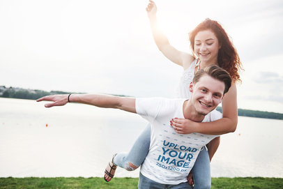 T-Shirt Mockup of a Playful Couple Having Fun by a Lake 46402-r-el2