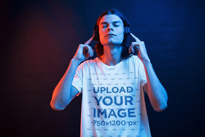 Mockup Featuring a Man Wearing a Basic T-Shirt and Listening to Music 46444-r-el2