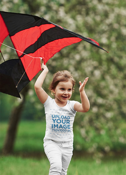 T-Shirt Mockup Featuring a Girl With a Kite 