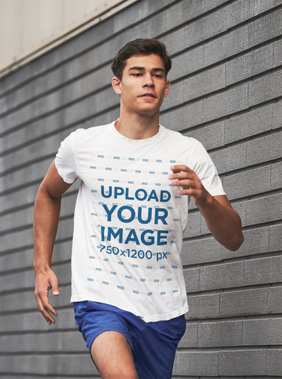 Mockup of a Man Wearing a Customizable T-Shirt While Running 