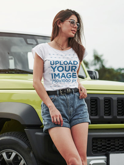 T-Shirt Mockup of a Woman Leaning Against an SUV 