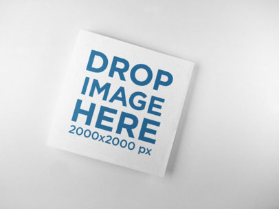 Mockup of a Square Booklet Lying on a Solid Surface