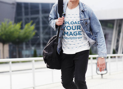 Basic T-Shirt Mockup Featuring a Man Walking