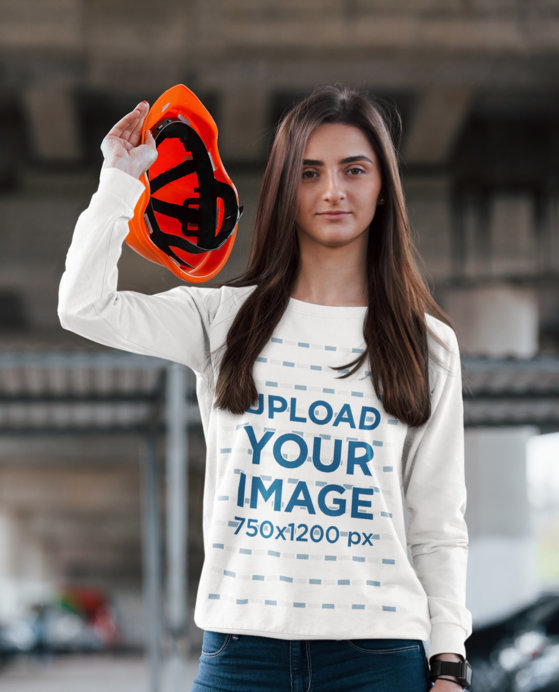 Sweatshirt Mockup of a Young Woman Holding a Construction Helmet