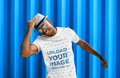 T-Shirt Mockup of a Happy Man with Sunglasses Posing by a Striped Wall 42513-r-el2