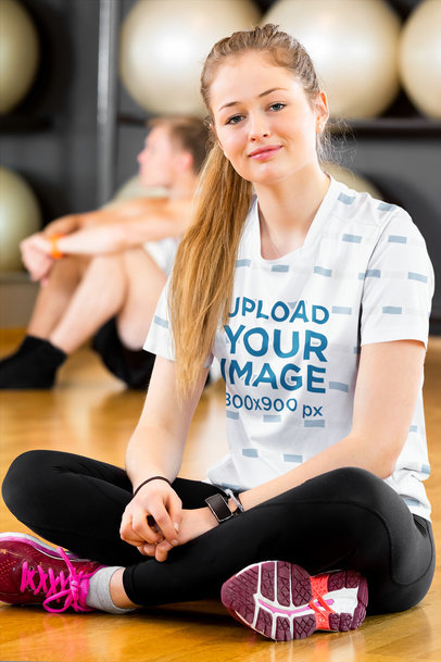 Sublimated Jersey Mockup of a Woman at a Fitness Studio