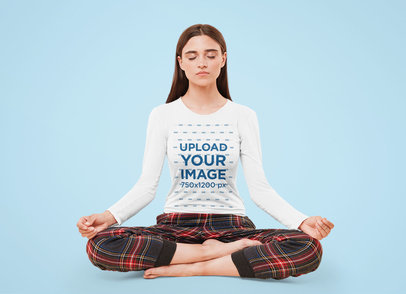 Long Sleeve Tee Mockup of a Woman Meditating in a Studio