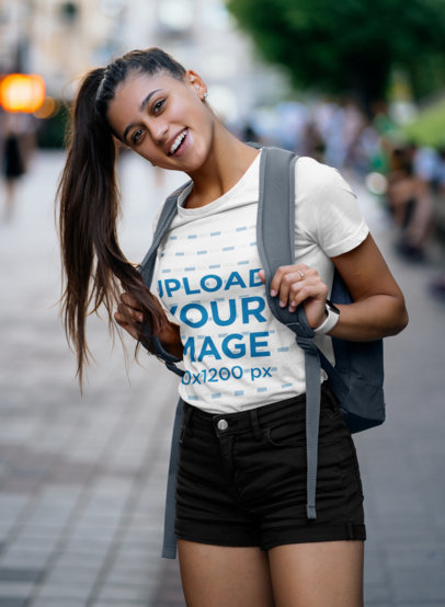 T-Shirt Mockup of a Young Woman Going to School with a High Pony Tail 46485-r-el2