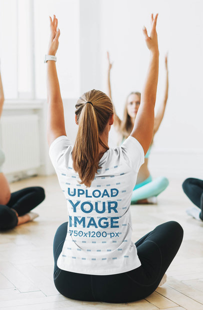 Back-View Mockup of a Yoga Teacher Wearing a T-Shirt