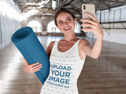 Tank Top Mockup of a Woman Taking a Selfie After Yoga Class