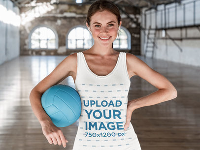 Tank Top Mockup of a Woman Holding a Volleyball 