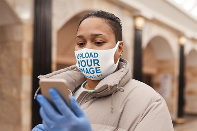 Face Mask Mockup Featuring a Woman at a City Using Her Phone 46725-r-el2