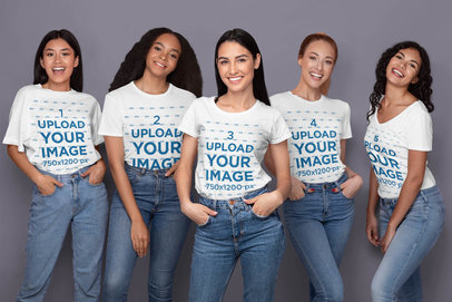 T-Shirt Mockup Featuring Five Women Posing in a Studio