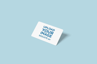 Mockup of a Credit Card Leaning in a Minimalistic Setting 