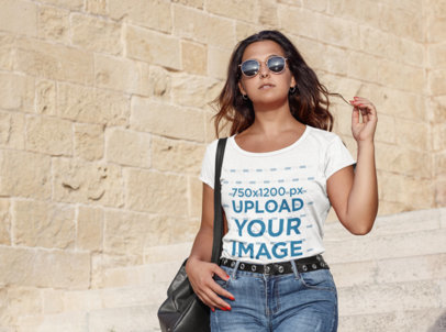 Mockup Featuring a Long-Haired Woman With Sunglasses Wearing a T-Shirt 
