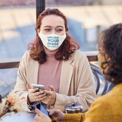 Face Mask Mockup of a Young Woman Talking with a Friend