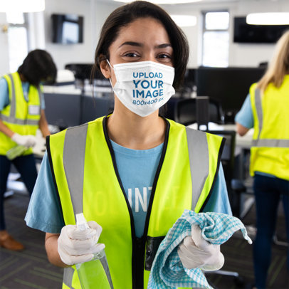 Face Mask Mockup of a Happy Young Woman Holding Cleaning Products 46601-r-el2