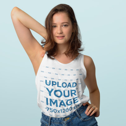 Mockup of a Woman Posing with a Tank Top Against a Solid Surface 46789-r-el2