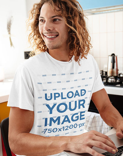 T-Shirt Mockup of a Long-Haired Man Working From Home