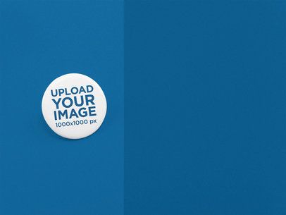 Big Button Mockup Standing on a Solid Surface of Two Colors a15133