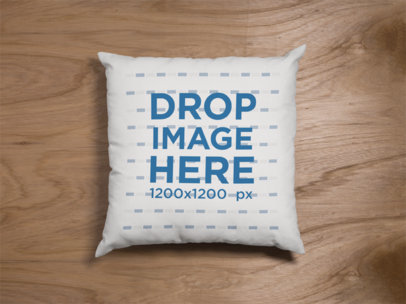 Mockup of a Square Pillow Lying on a Wooden Surface a15120
