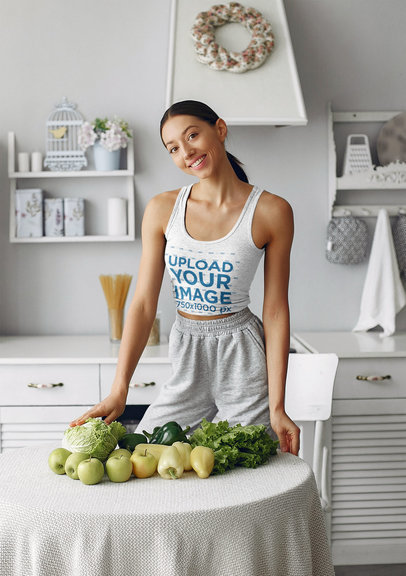 Tank Top Mockup Featuring a Woman and Some Healthy Food