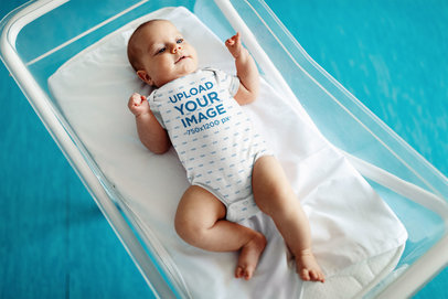 Onesie Mockup Featuring a Baby Boy on a Small Crib 45748-r-el2