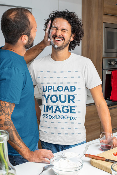 T-Shirt Mockup Featuring an LGBT Couple Having Fun While Cooking 