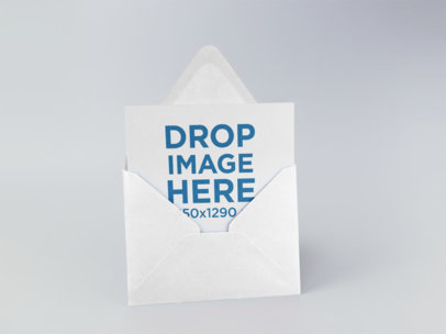 Invitation Card in an Envelope Template Standing on a Solid Surface