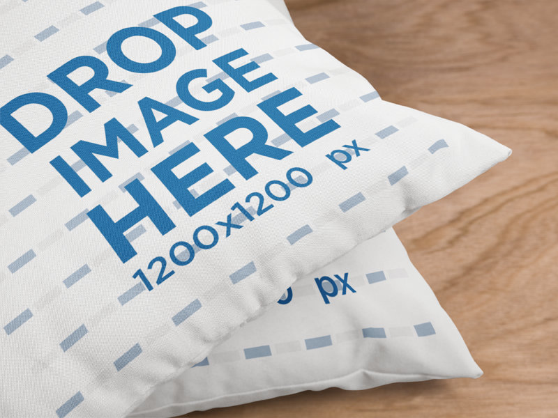 Closeup Template of a Pair of Pillows Lying on a Wooden Surface