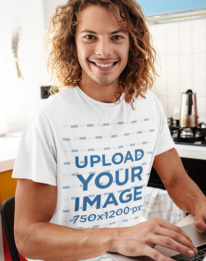 T-Shirt Mockup of a Long-Haired Man Working at Home