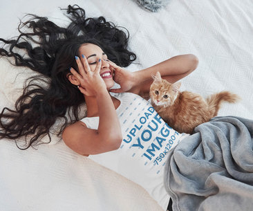 Tank Top Mockup of a Woman Lying in Bed with Her Cat