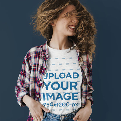 T-Shirt Mockup of a Woman Shaking Her Curly Mane