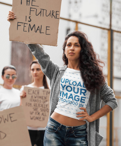 T-Shirt Mockup of a Woman at a Protest with a Feminist Sign 