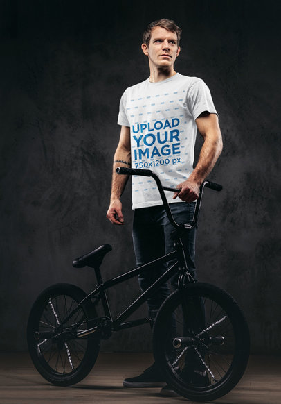 T-Shirt Mockup of a Man Posing with an Acrobatic Bicycle 43162r-el2