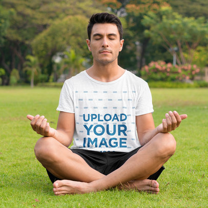 T-Shirt Mockup of a Man Meditating at a Park