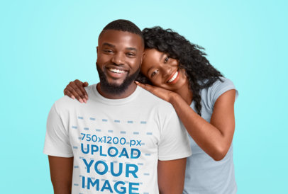 T-Shirt Mockup of a Bearded Man Posing With His Girlfriend at a Studio