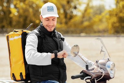 Dad Hat Mockup of a Delivery Man on His Scooter