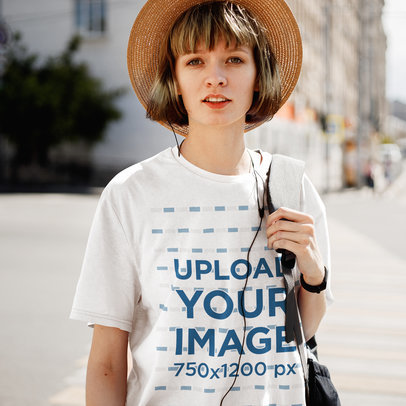 T-Shirt Mockup Featuring a Woman Doing a City Tour